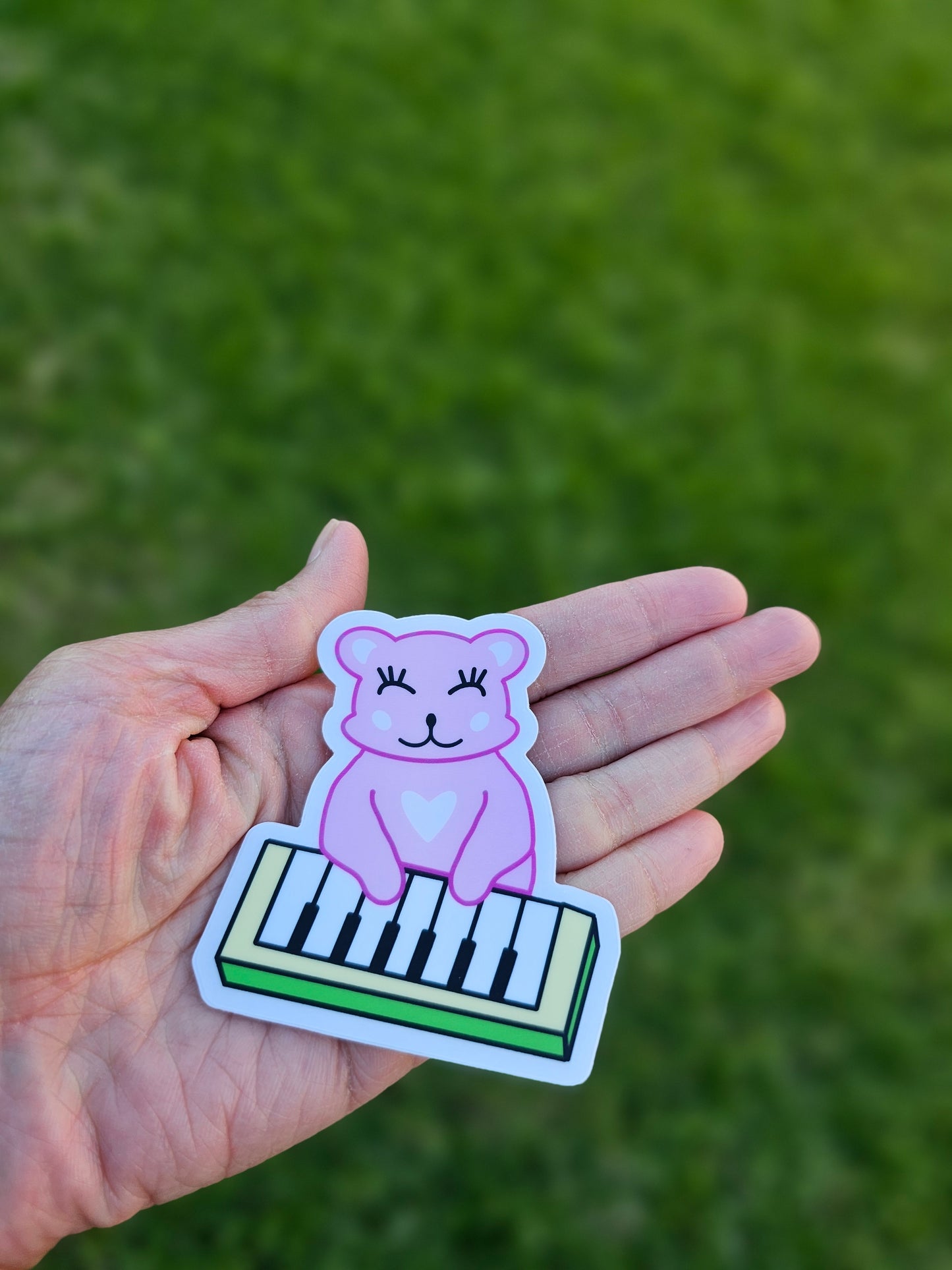 Beary bear pink playing piano